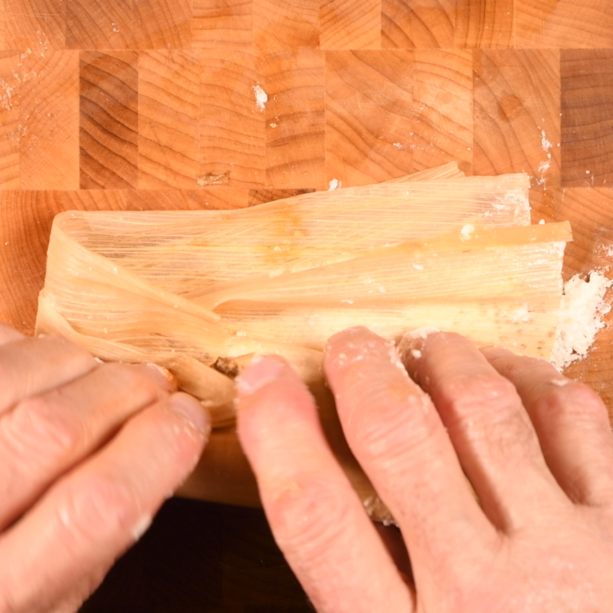Fold over to form the tamale.