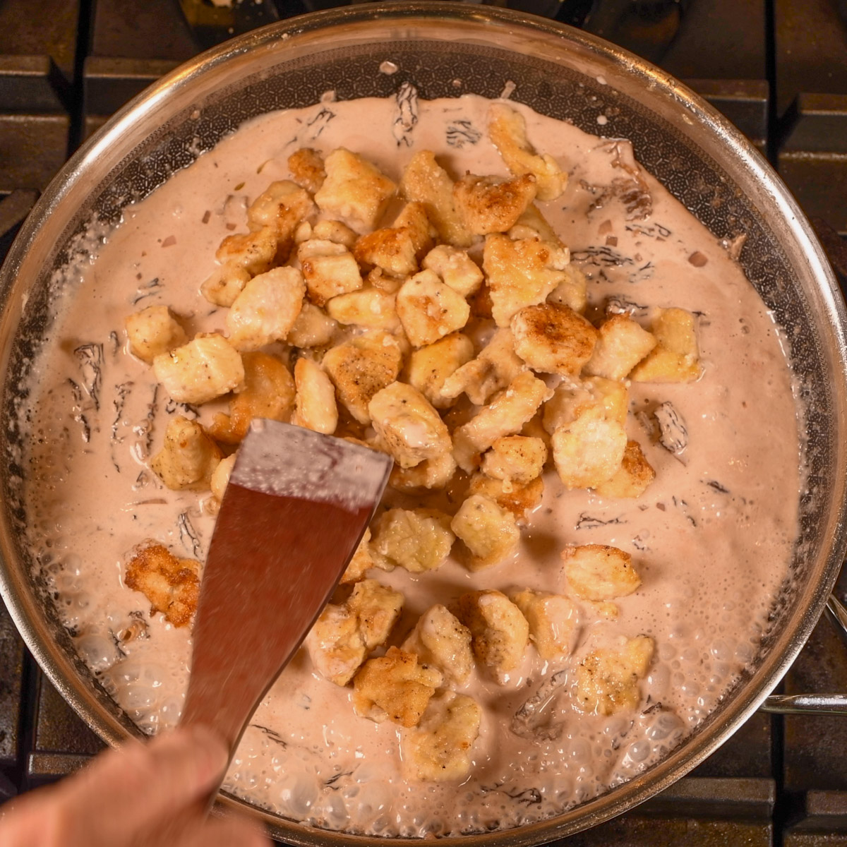 Add chicken to morel mushrooms.