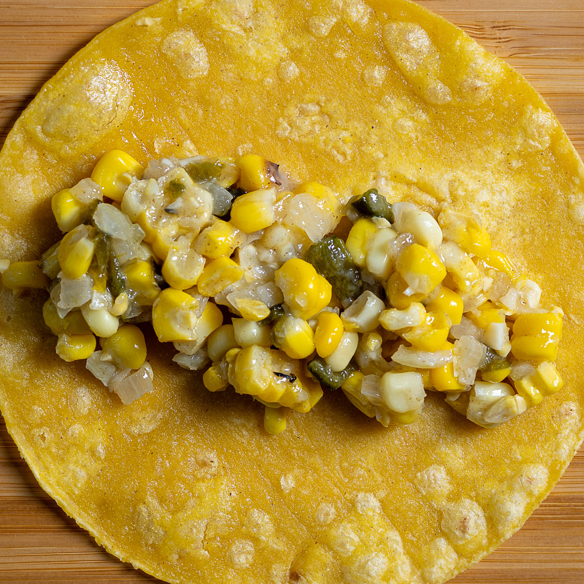 Place corn mixture in the center of a tortilla.