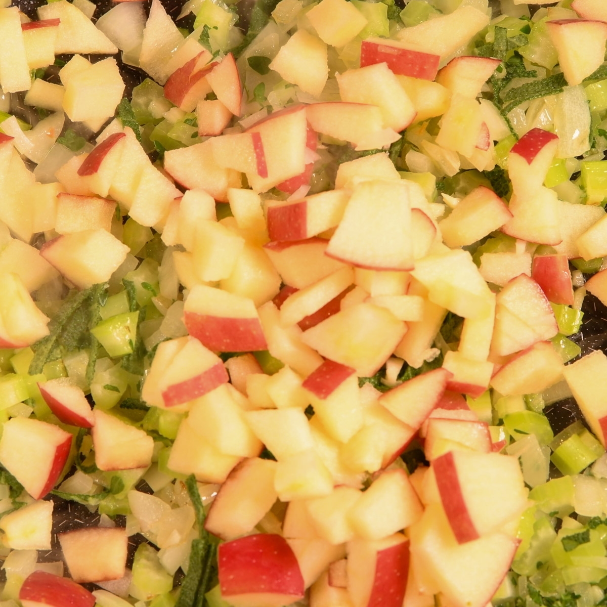 Add apples to the vegetables.