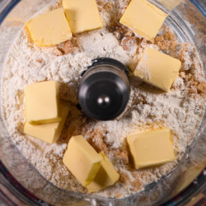 Add the topping ingredients to a food processor.