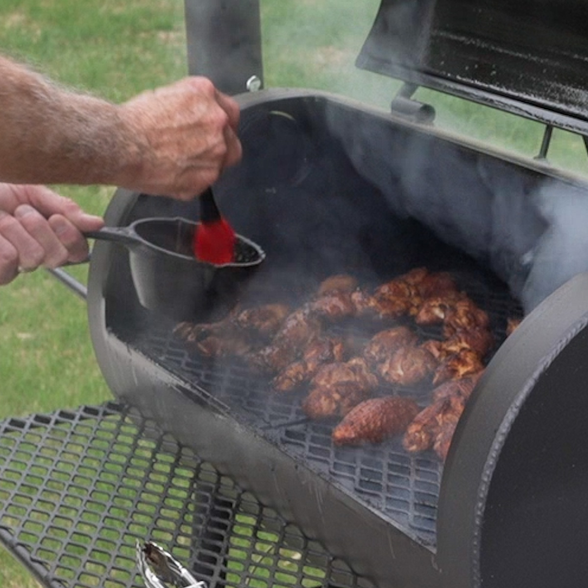 Baste the chicken wings.