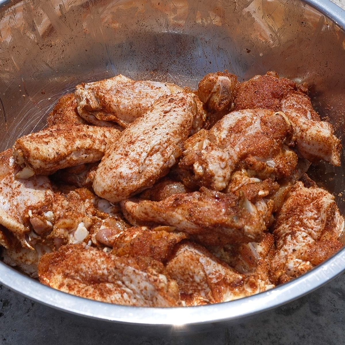 Rinse the wings and apply a dry rub.