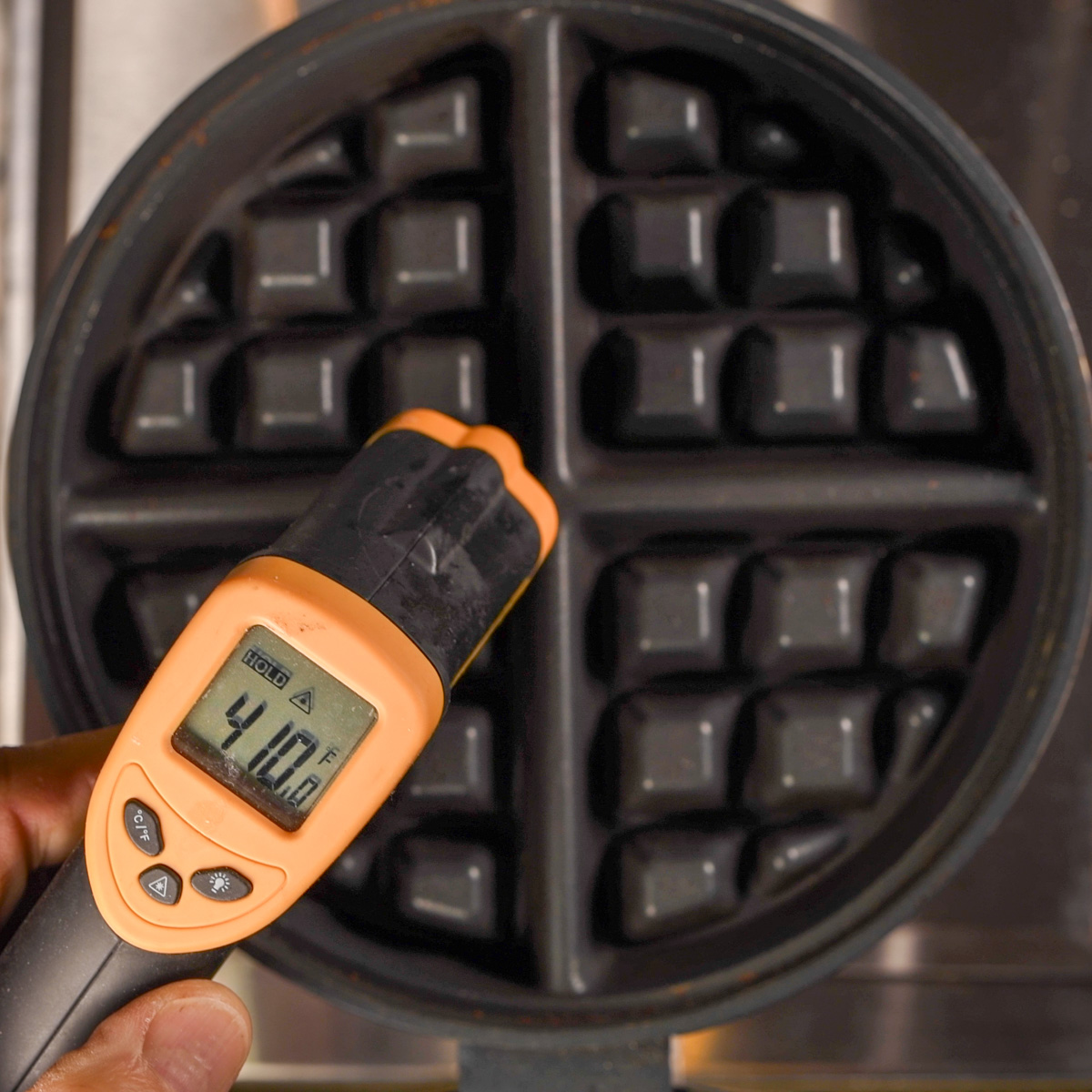 Check the temperature of the waffle iron.