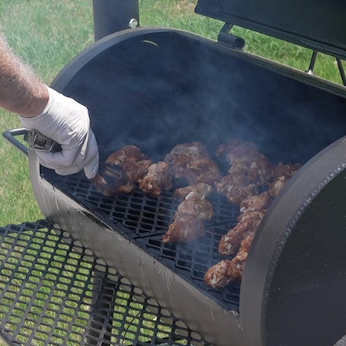 Add a pan of water to the smoker.