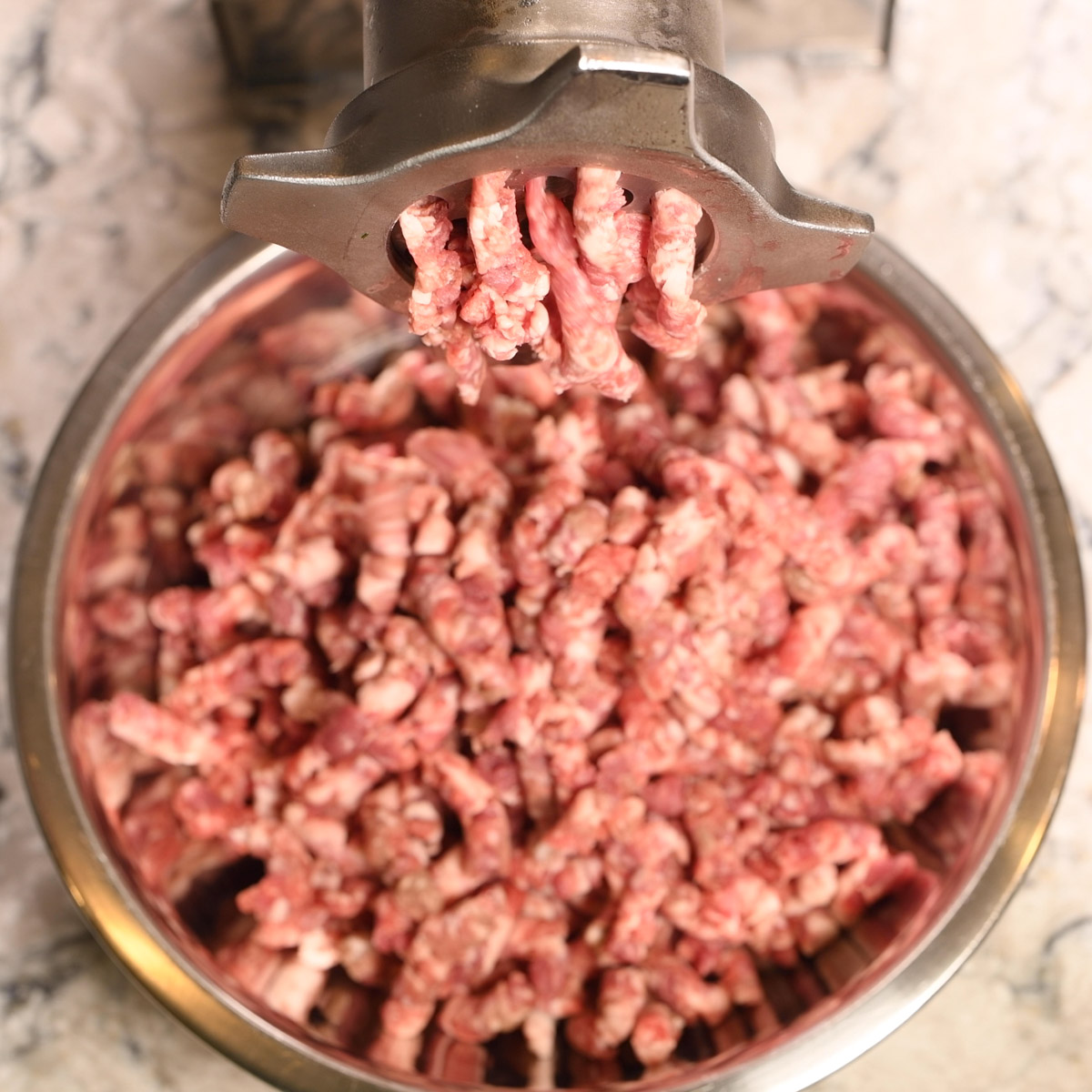 Grind the meat using a course grinding plate.