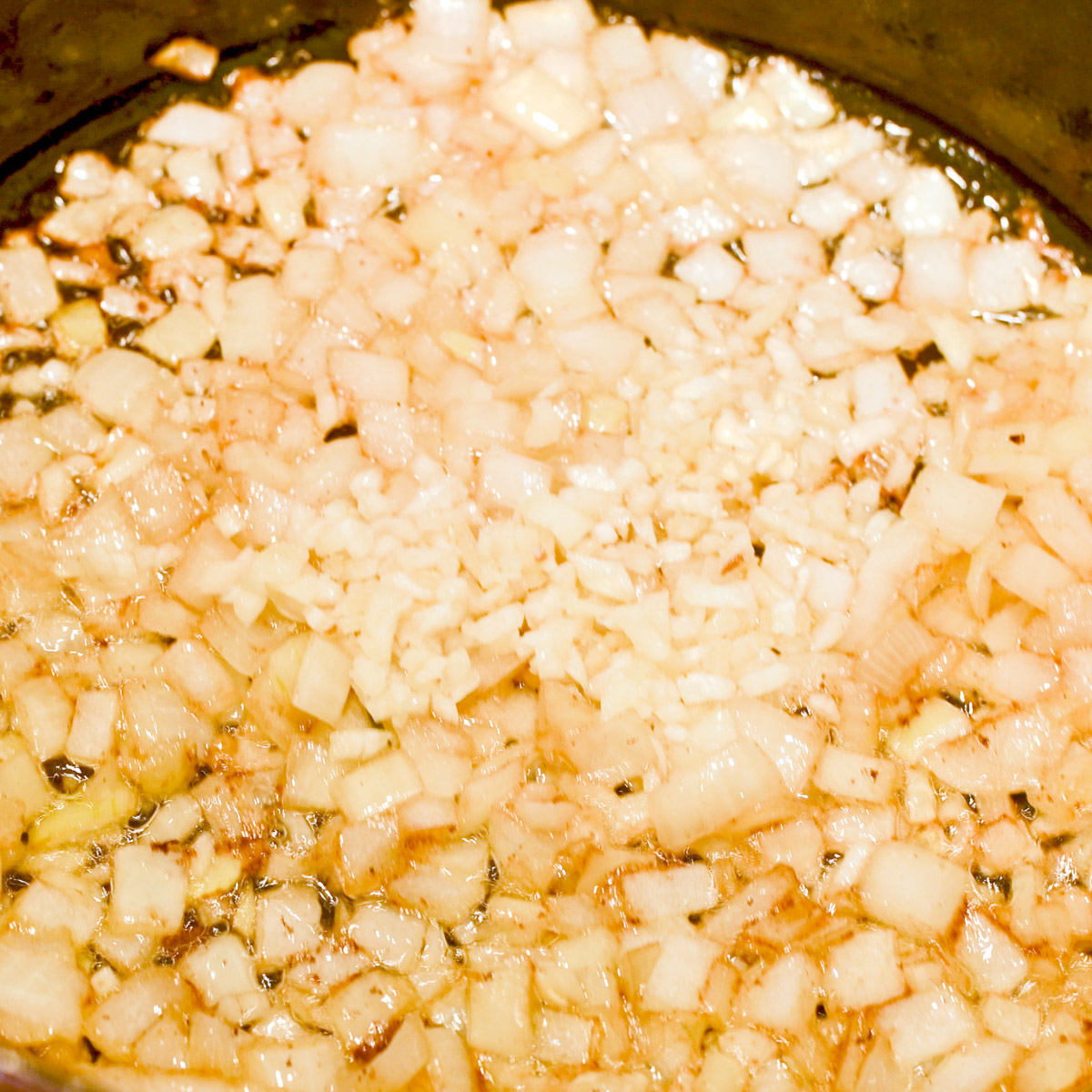 Cook the onions in the bacon grease.