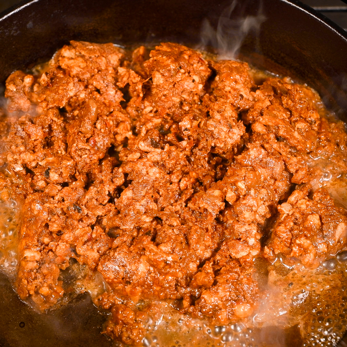 Cook the chorizo in a hot skillet.