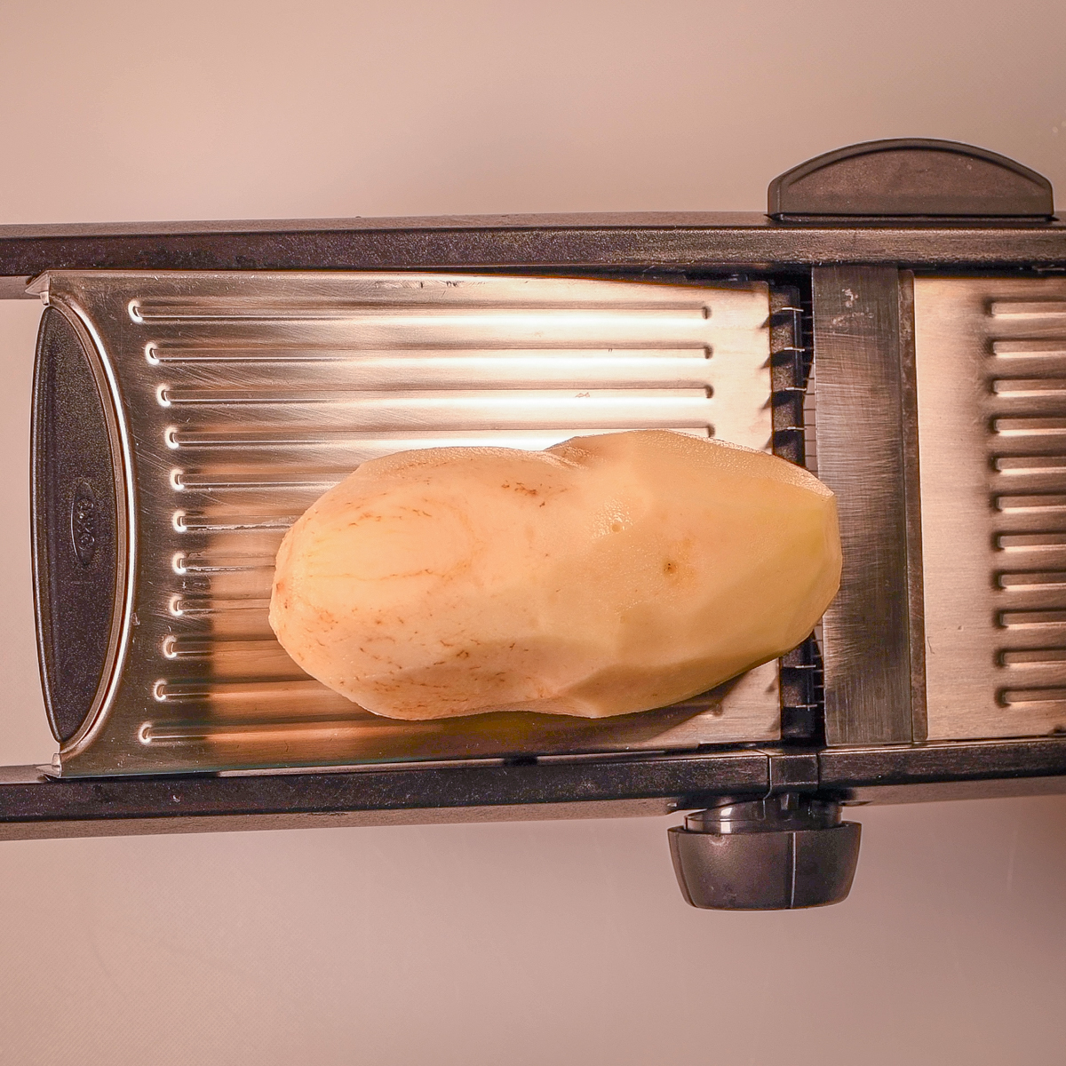 Make consistent fries by cutting the potatoes using a mandolin.