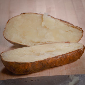Cut the potatoes in half and scoop out the potato pulp.