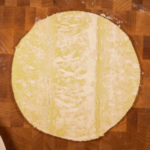 Cut puff pastry into 8" round.