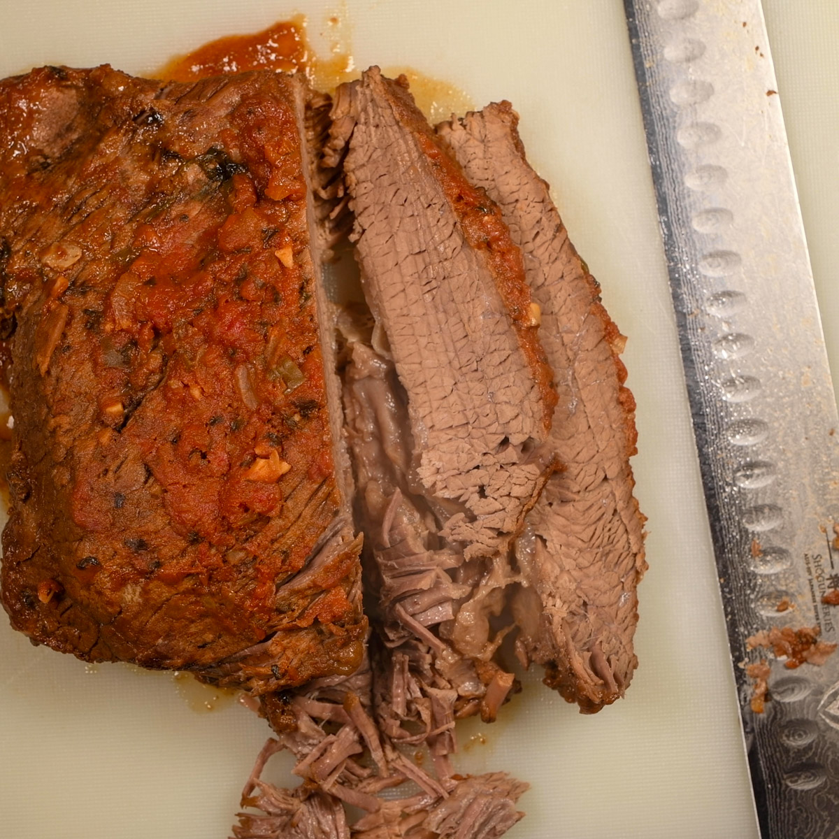 Cut the brisket into ¼" thick slices.