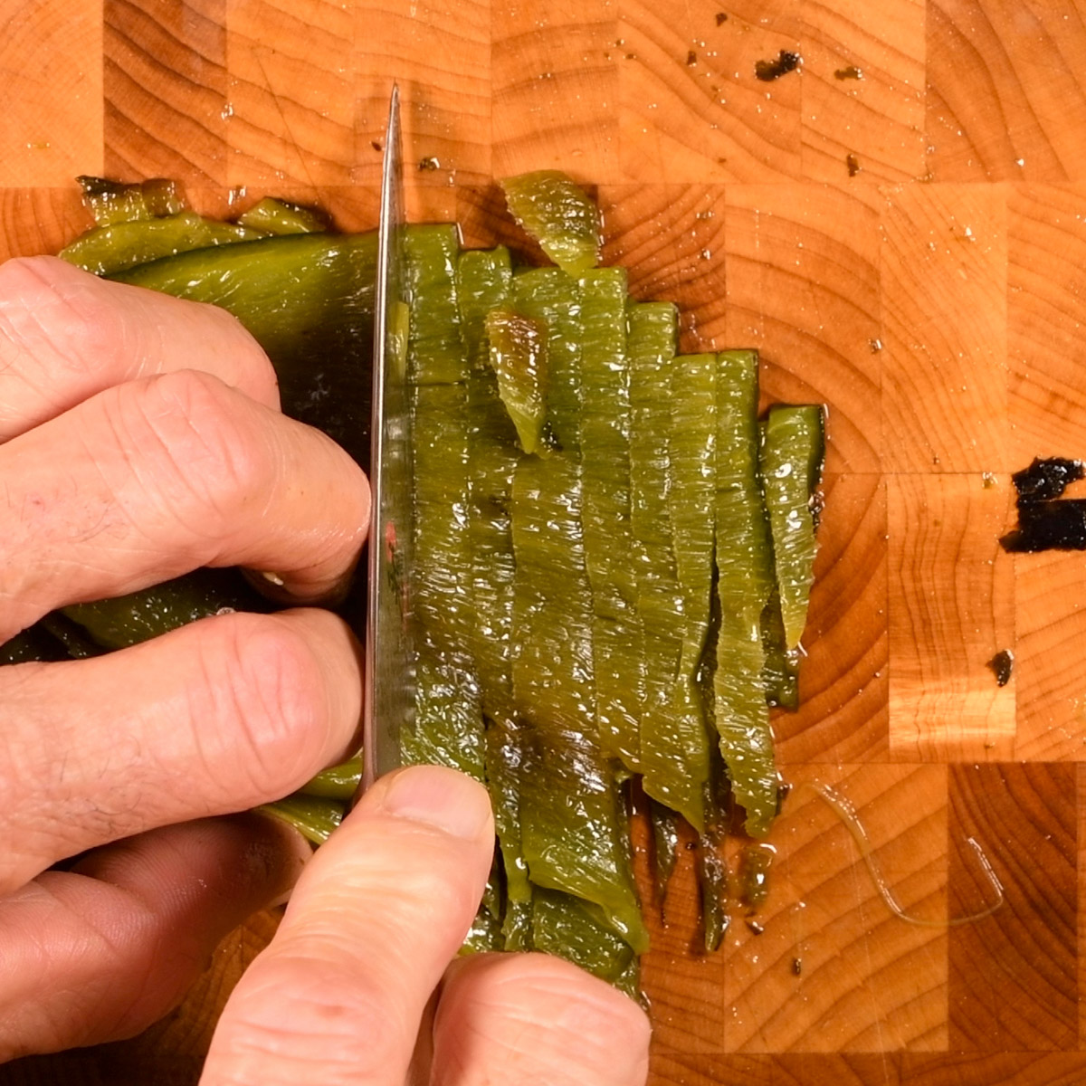 Cut the poblano peppers into ⅛" strips.