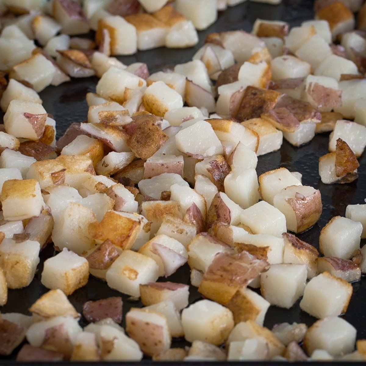 Boil then pan fry the diced red potatoes.