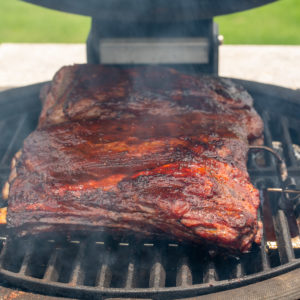 Smoke the ribs low and slow.