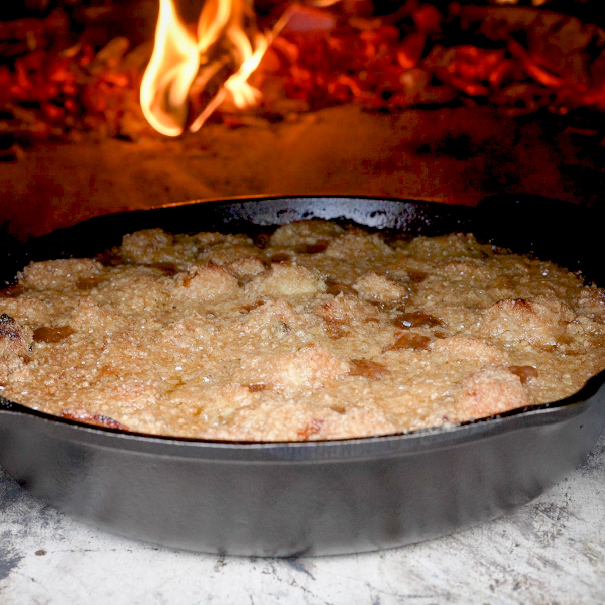 Bacon apple crisp in a wood-fired oven.