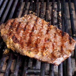 Grill the flank steak on both sides.