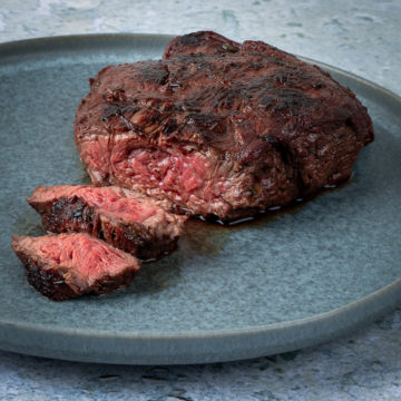 Flat iron steak cooked to medium-rare