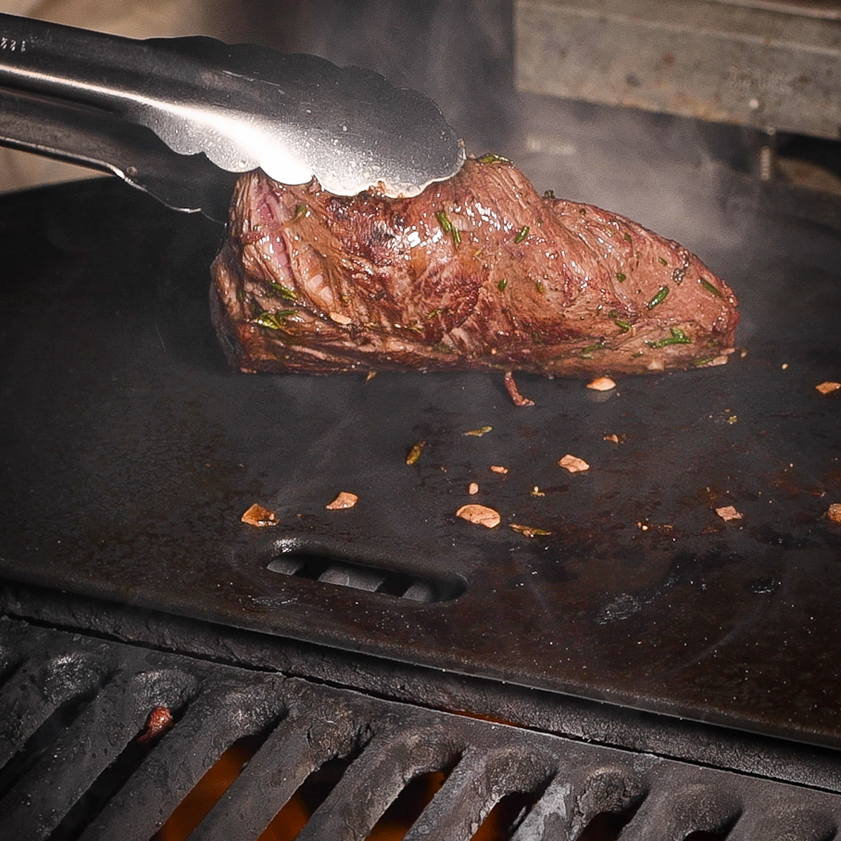 Checking the sear on a flat iron steak