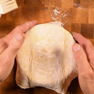 Fold puff pastry over the top and seal.