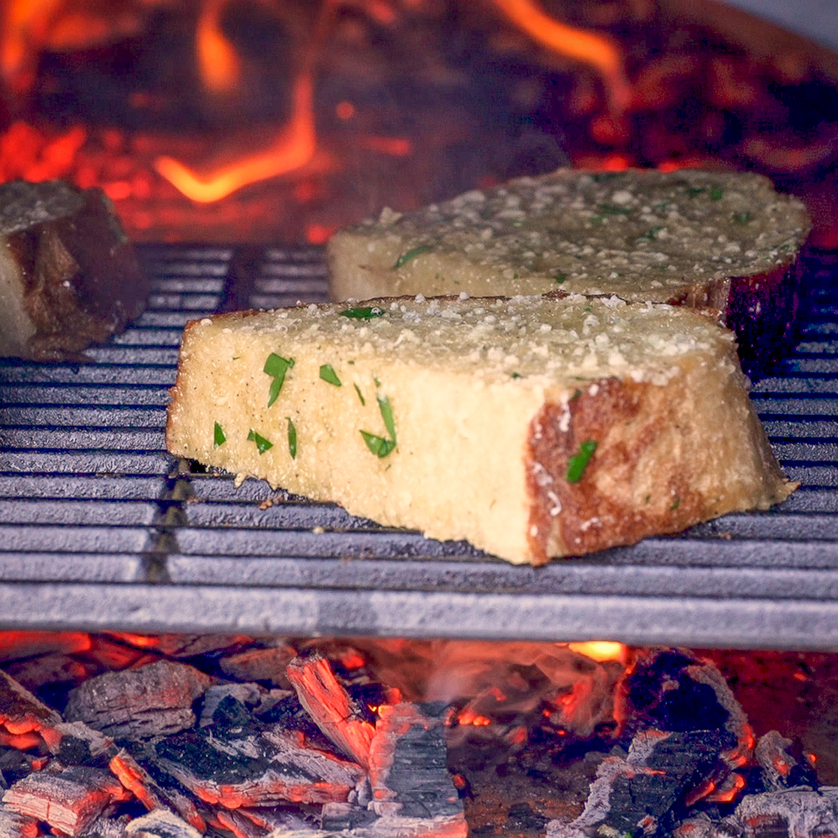 Garlic bread cooking on a Tuscan grill.