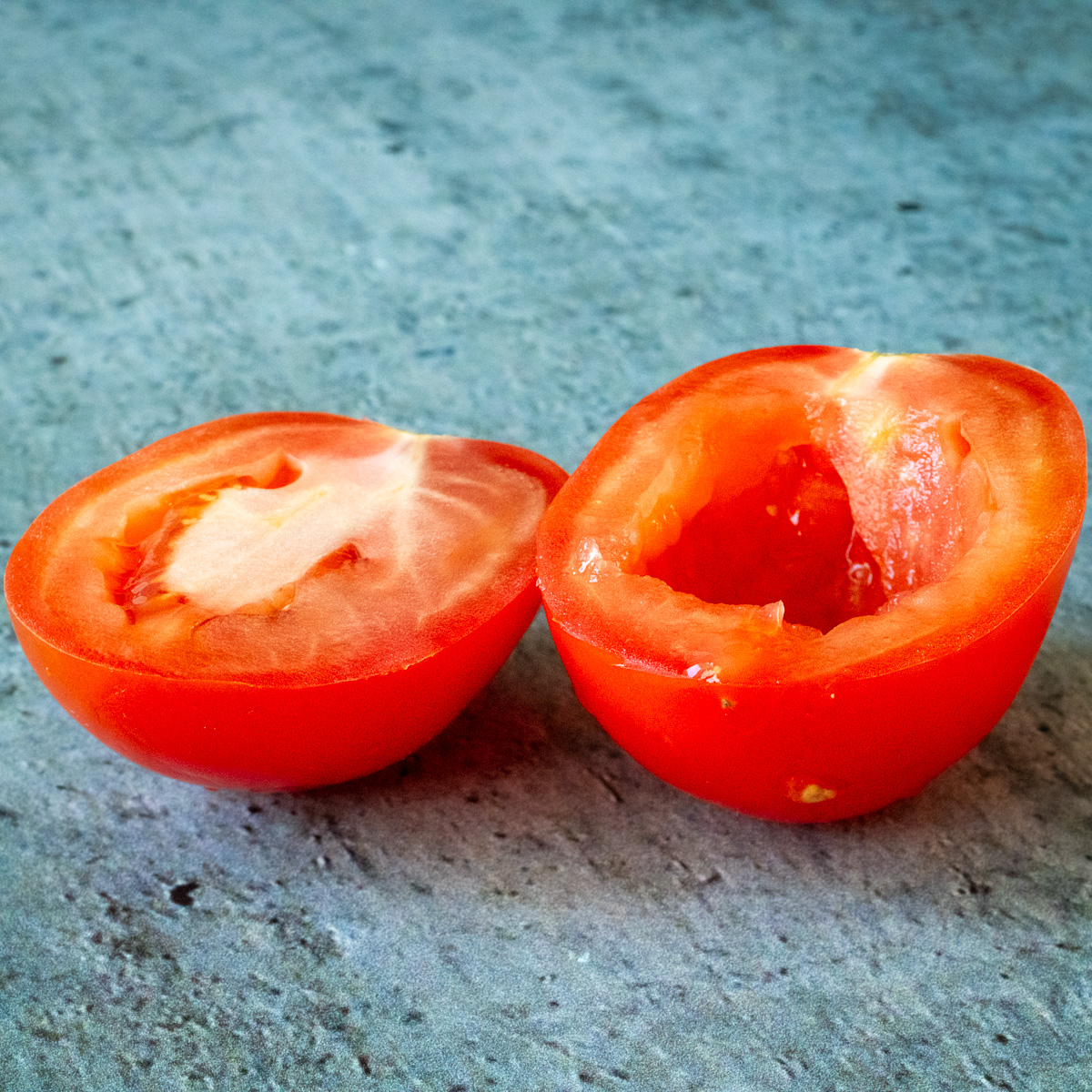 Roma tomato cut in half.