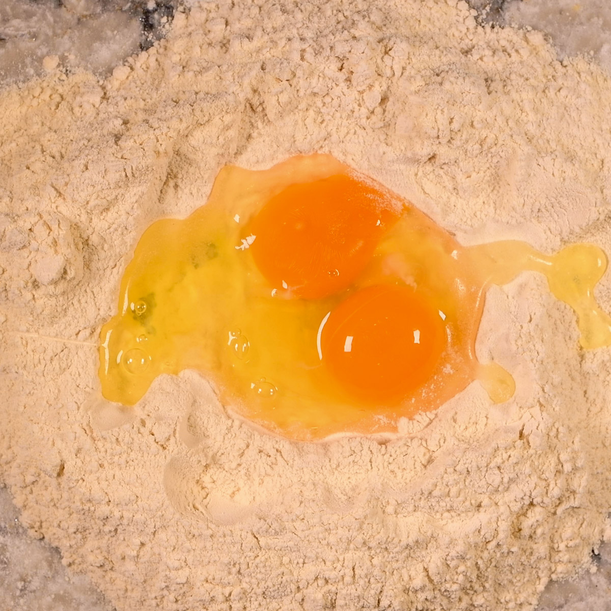 Eggs in flour nest.