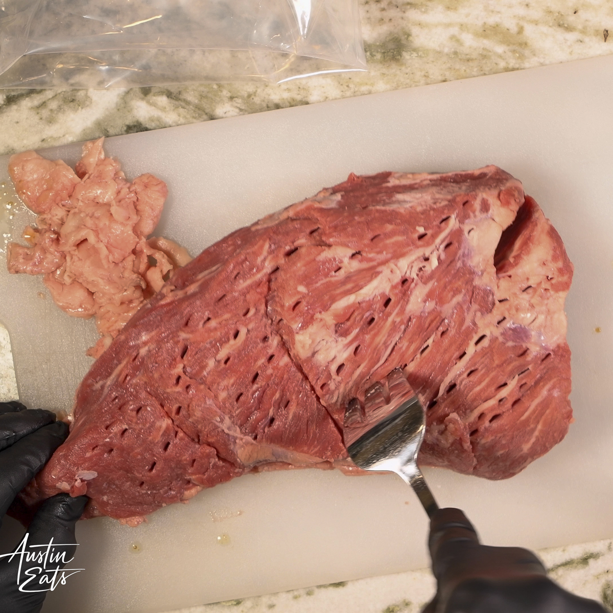 Use a fork to poke holes in boths sides of the tri-tip.