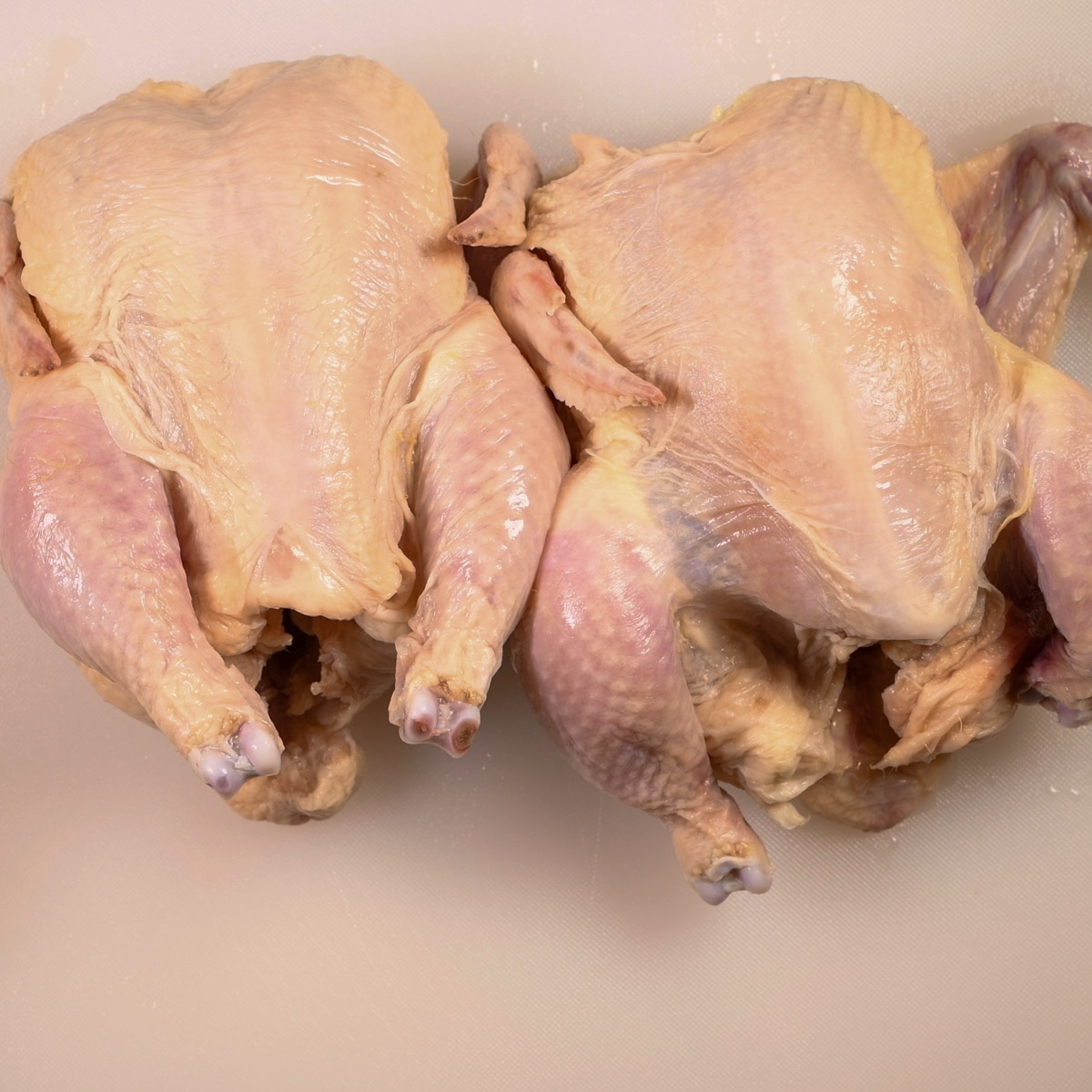 Prepare the Cornish hens by first wiping with a dry paper towel.