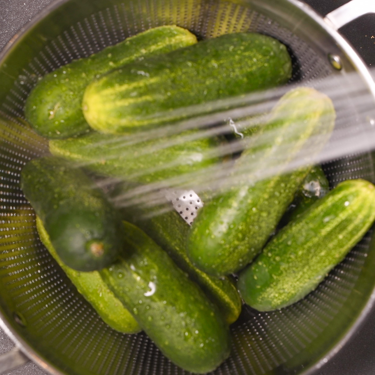 Rinse the cucumbers.