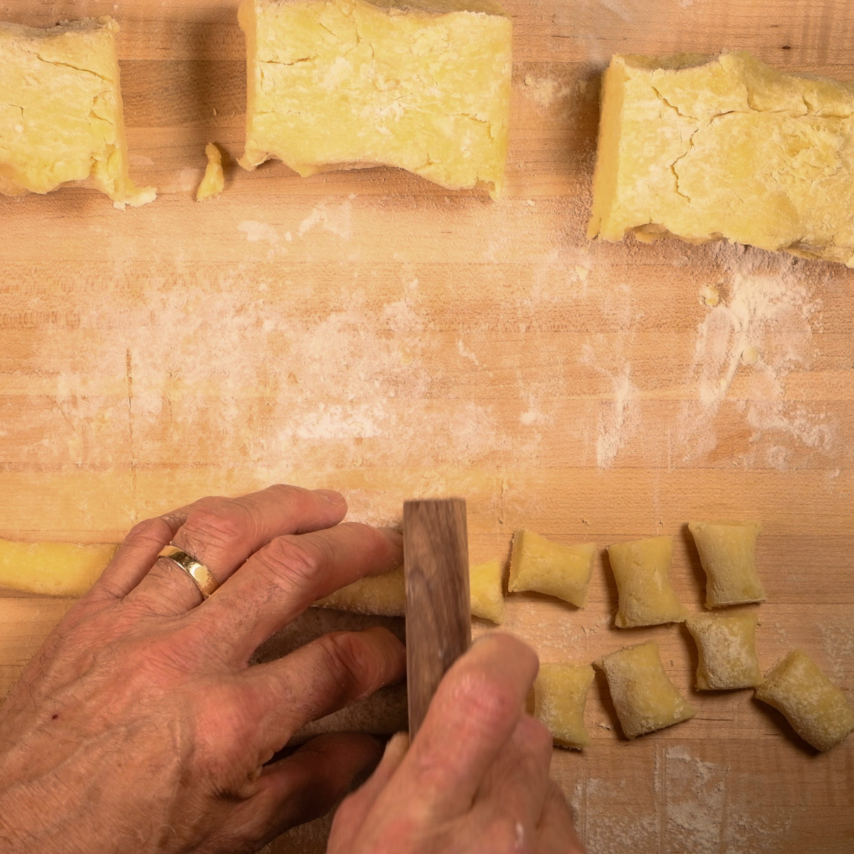 Roll each piece of dough into a ¾" strand.