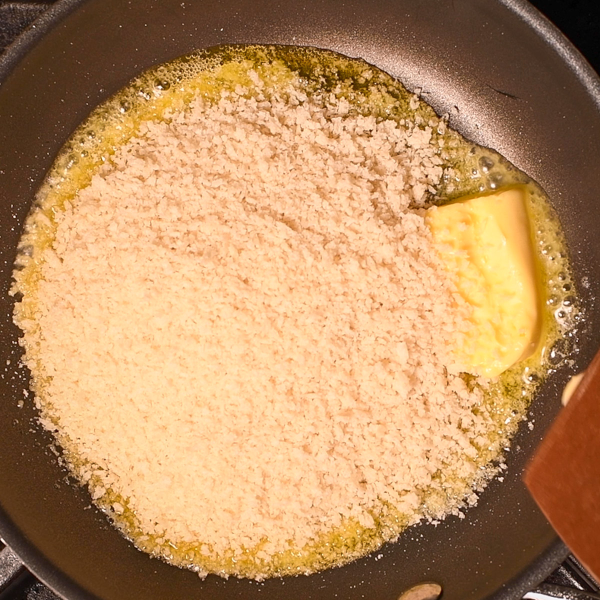 Sauté panko breadcrumbs in butter.