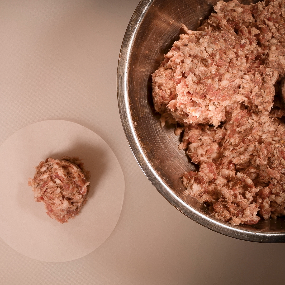 Use a #16 scoop to form uniform balls of ground sausage.