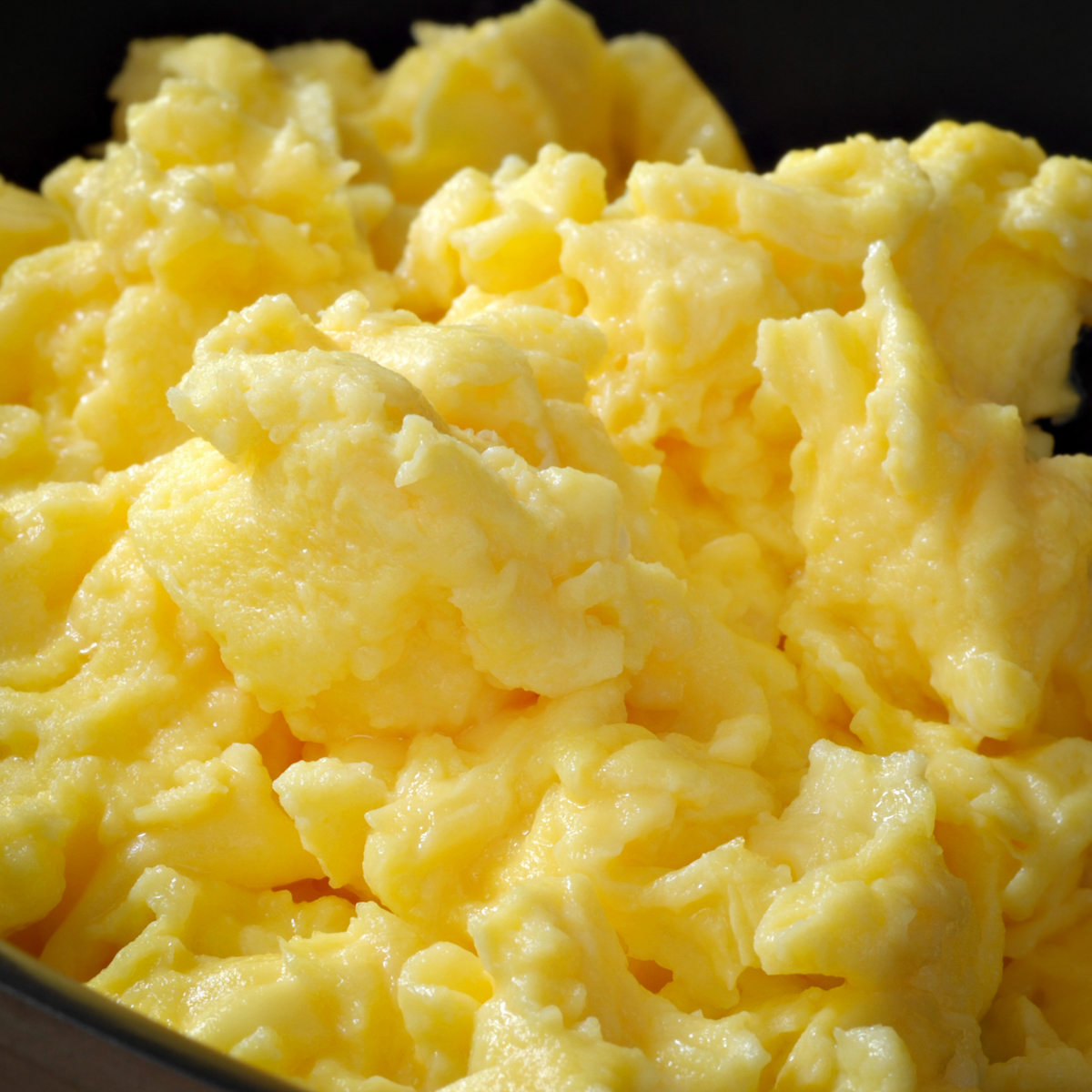 Cook the scrambled eggs.