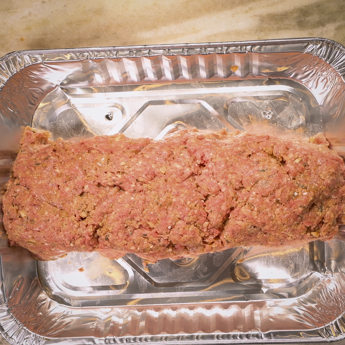 Shape the meat into a loaf.