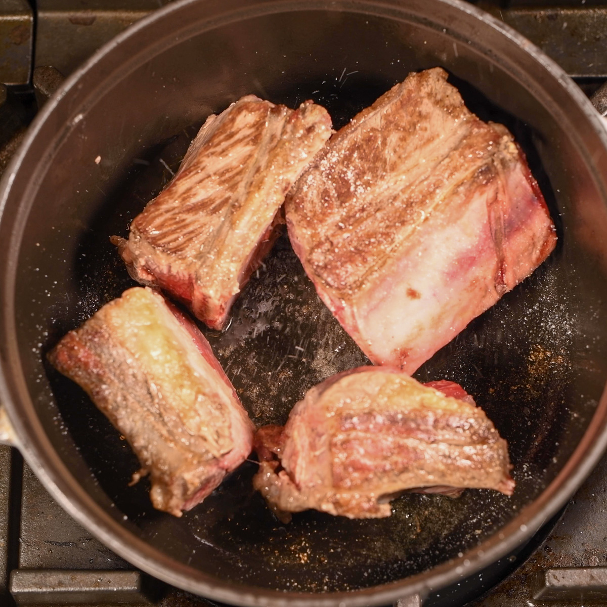 Sear short ribs on all sides.