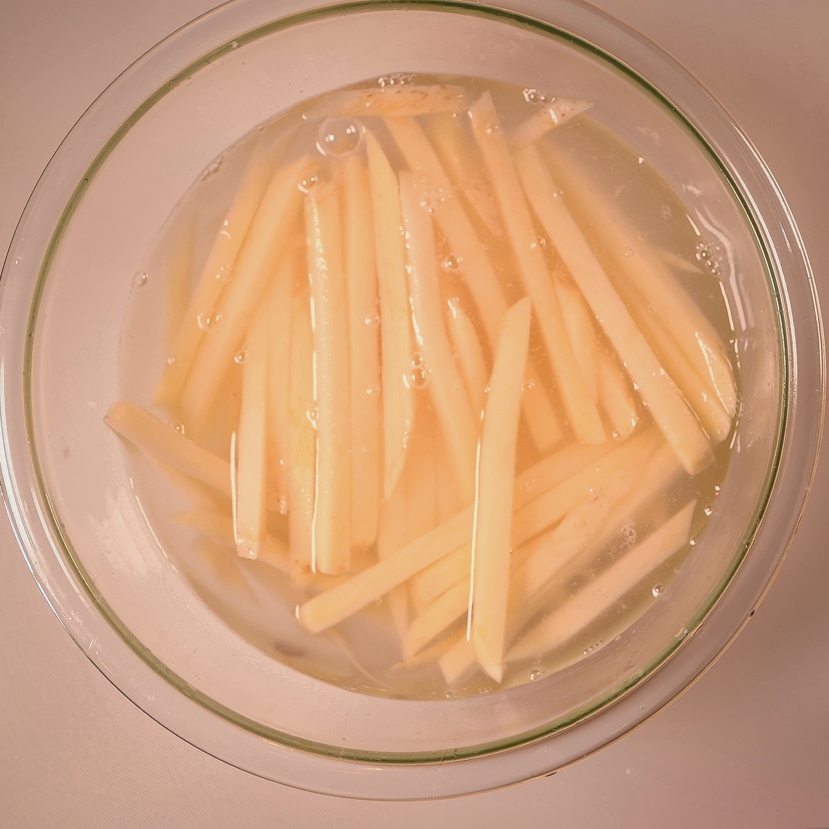 Soak the fries in the sugary solution.