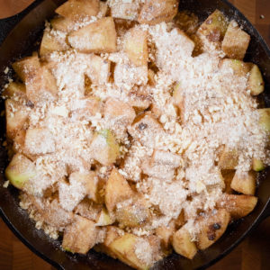 Spread the topping over the apple mixture.