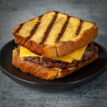 Grilled cheeseburger on Texas toast.