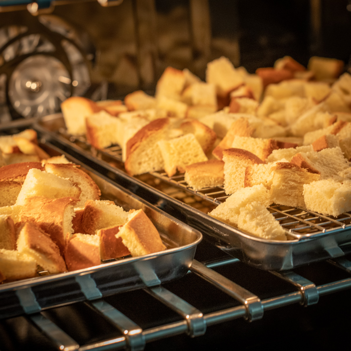 Bread cubes in the oven.