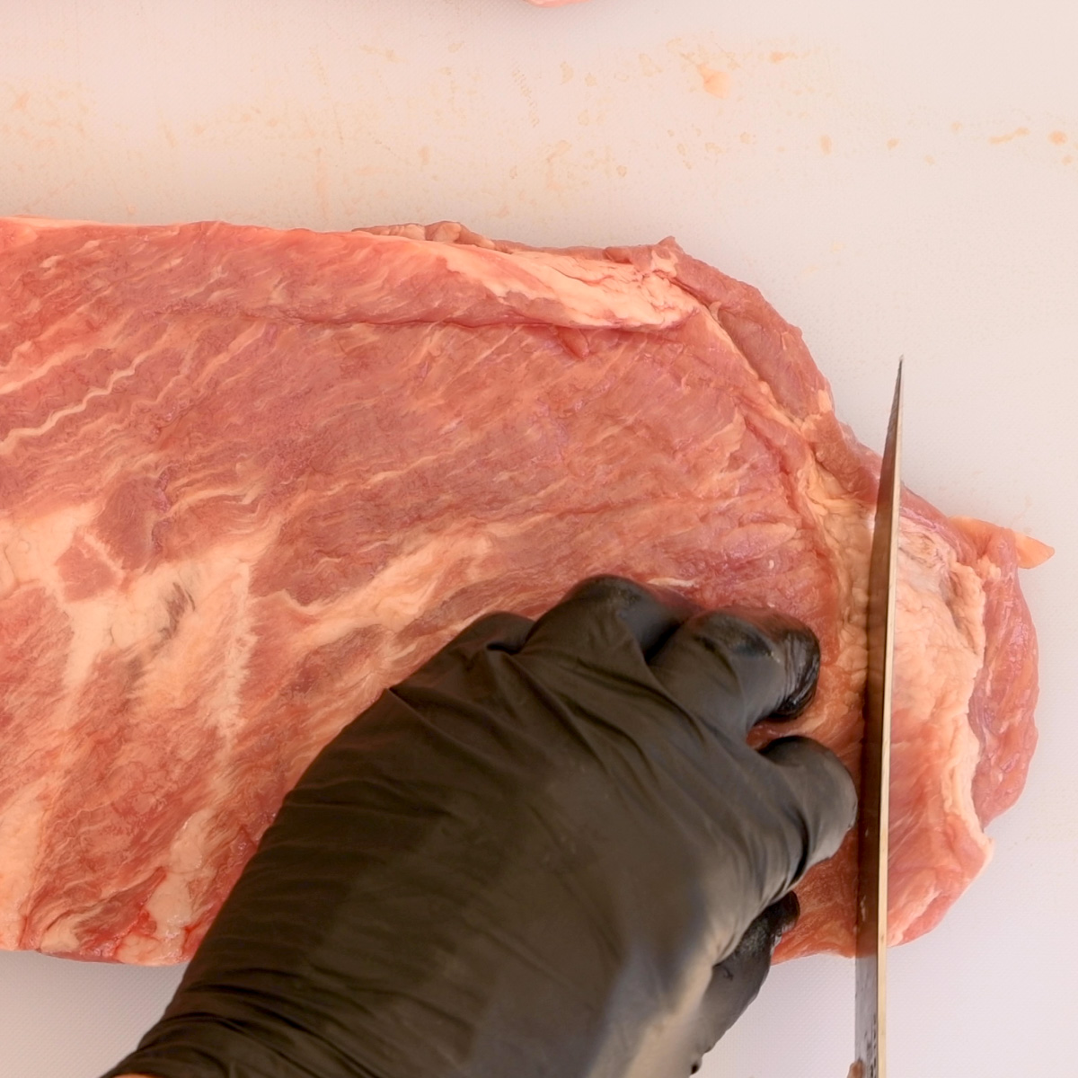 Trim the last bone from the ribs.