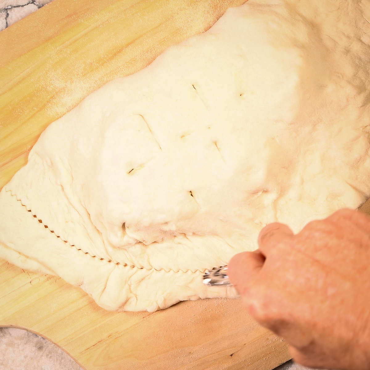 Trim the calzone.