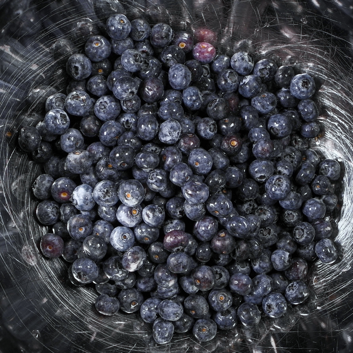 Rinse the blueberries under cold water.