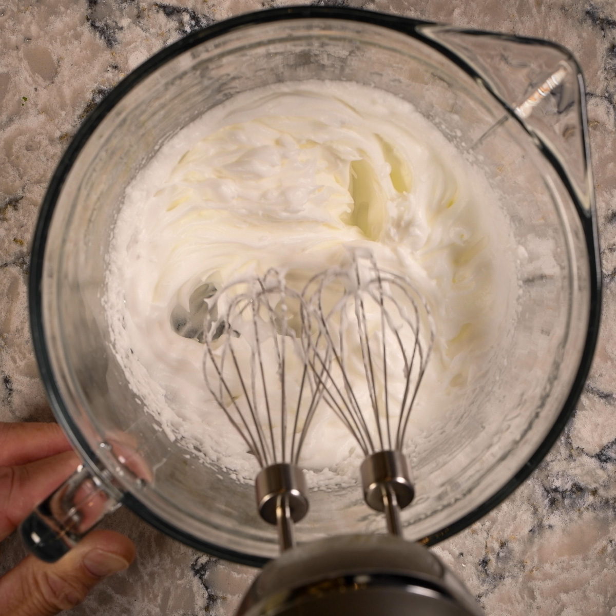 Whip egg whites in a separate bowl.