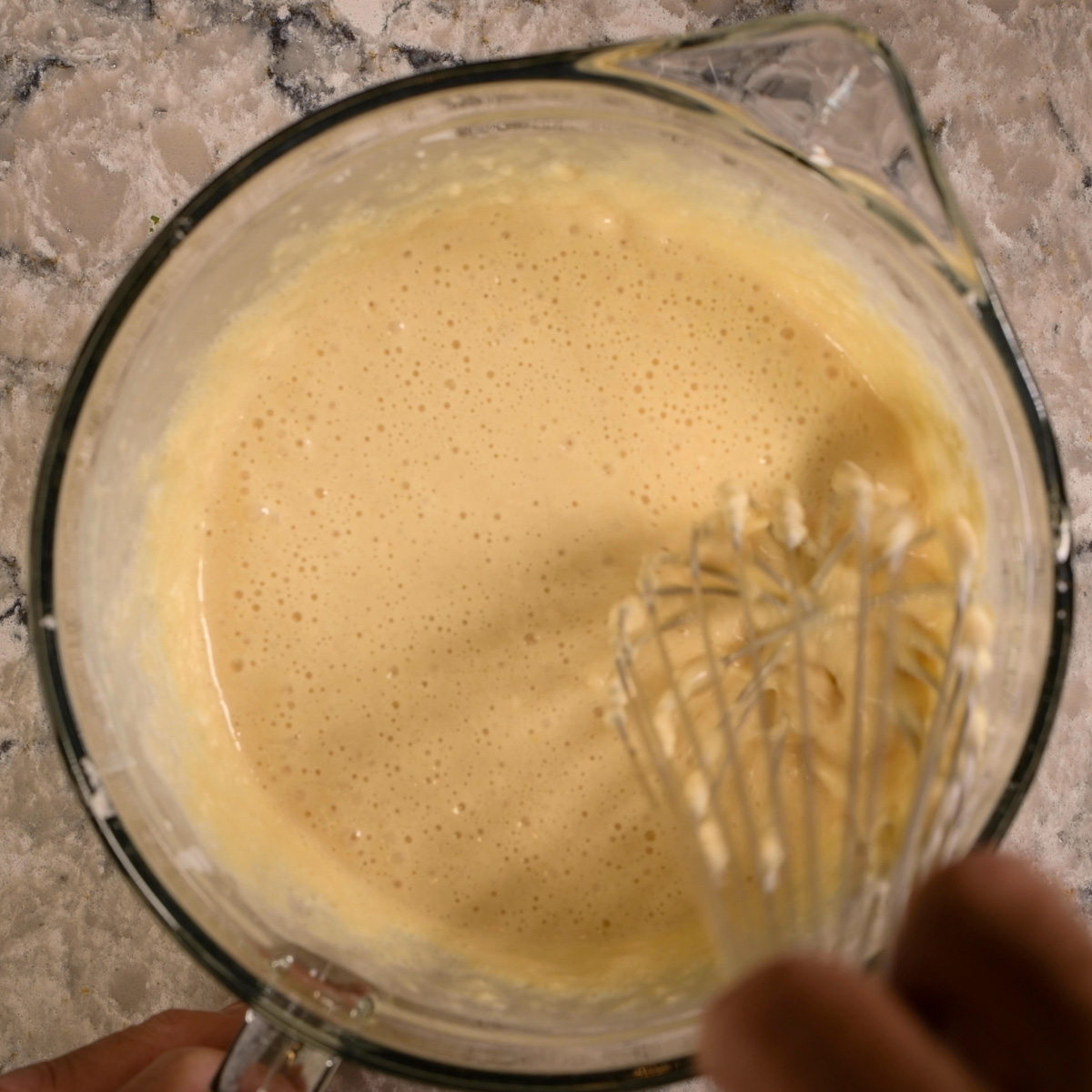 Whisk dry ingredients into wet ingredients.